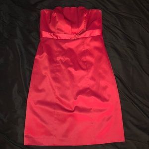 Short red strapless dress. Good condition.